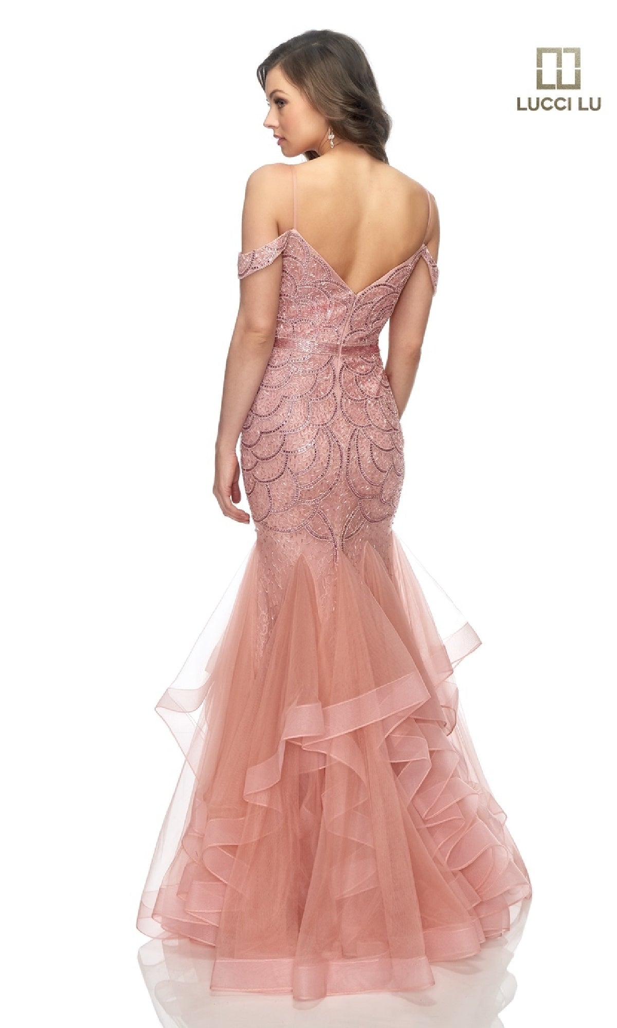 A woman seen from the back wears the Lucci Lu 2147 open-back beaded mermaid prom dress in blush pink, featuring a fitted off-the-shoulder bodice, tulle skirt, and intricate lace; Lucci Lu logo is shown top right.